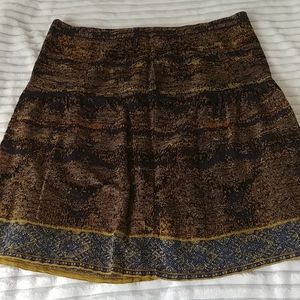 Knee length gold and blue skirt